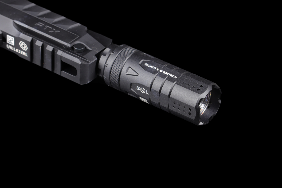 GATE SOL zamontowany na PTX — detal przedniej soczewki; pistolet PTX i przewód HPA sprzedawane osobno.